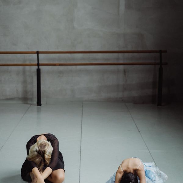 A person performing a gentle stretching exercise, highlighting flexibility.
